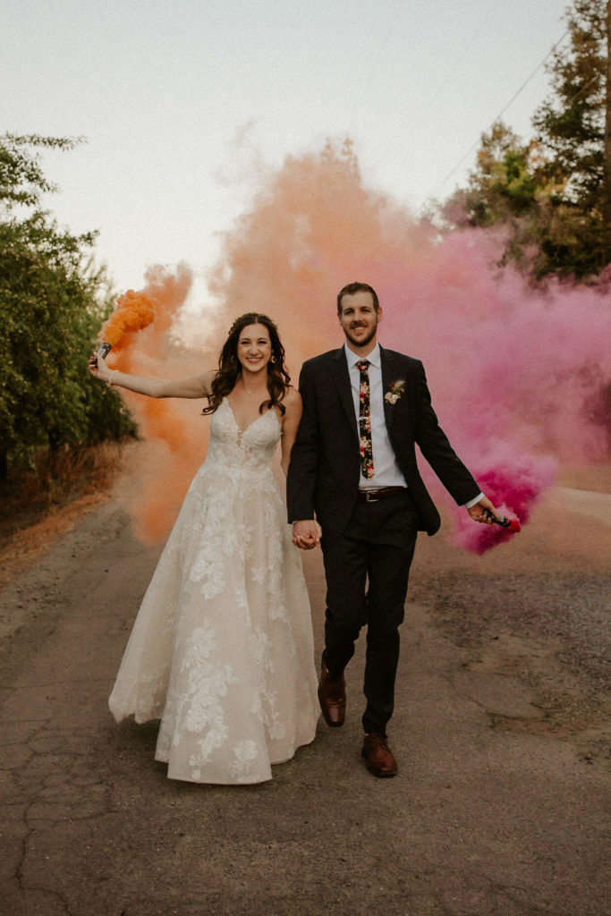 bride and groom sunset photos fun smoke bombs colorful wedding photographer modesto oakdale turlock
