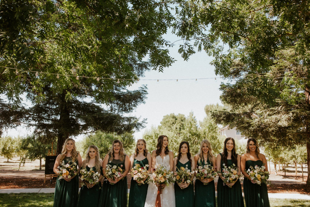 modesto wedding photographer bridal party bridesmaids green dresses florals bouquets